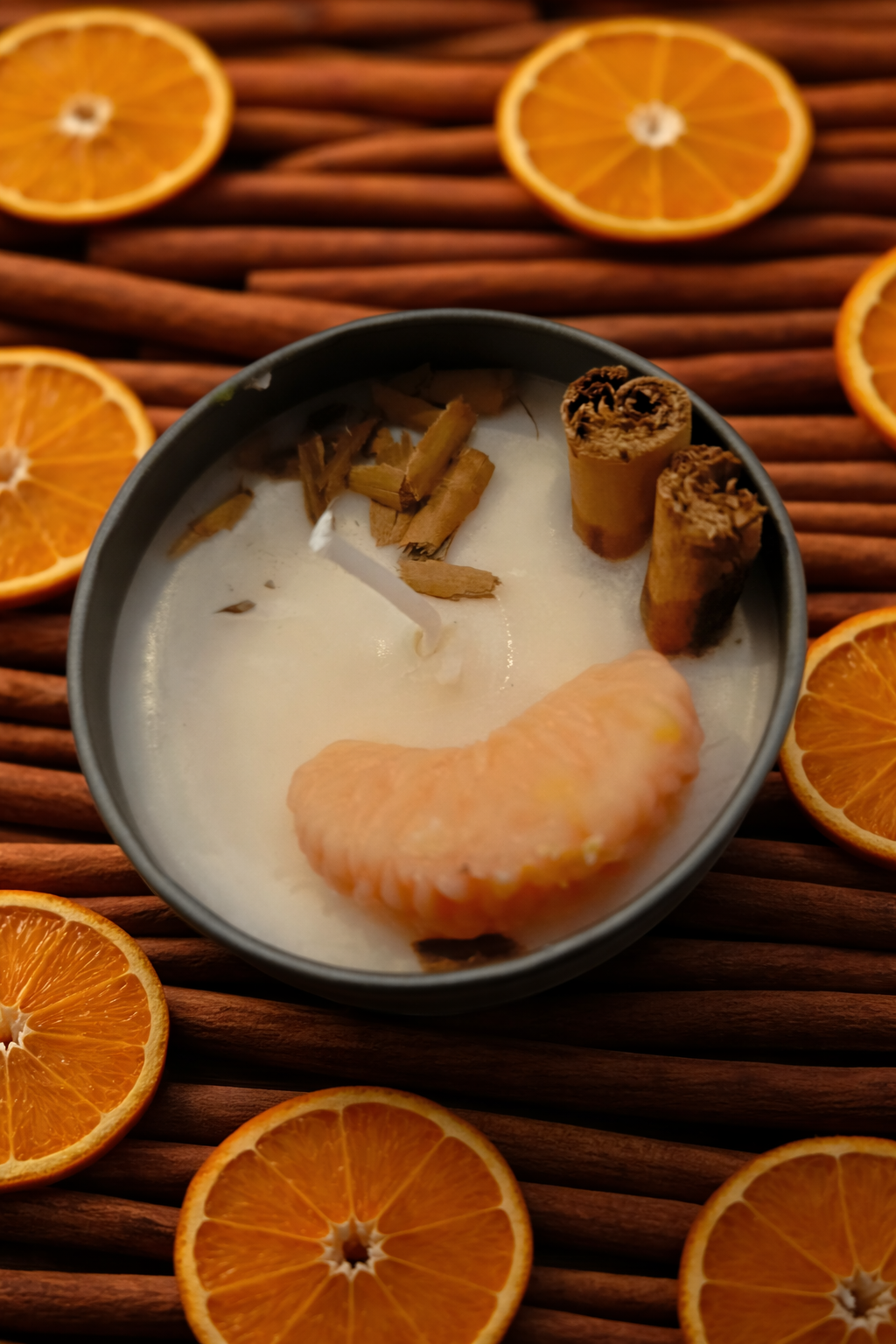 Vela de canela y naranja